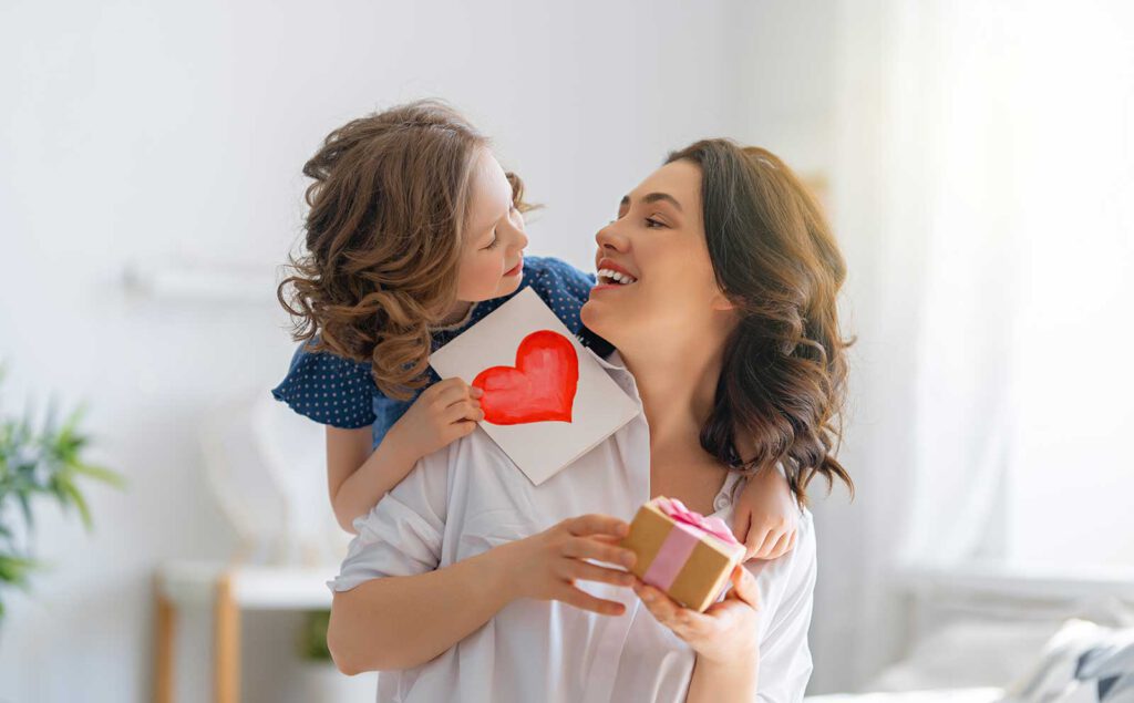 girl hugging her mom