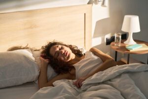woman sleeping in bed